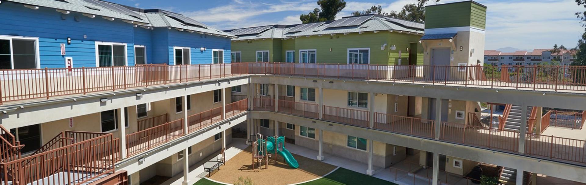 The garden apartments are colorful and bright.