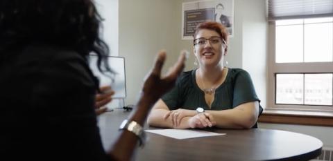 A counselor works with a client.