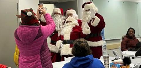 Santa Claus volunteers gather together at MHP