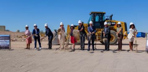 A group with shovels marks the groundbreaking of Serene Pines.